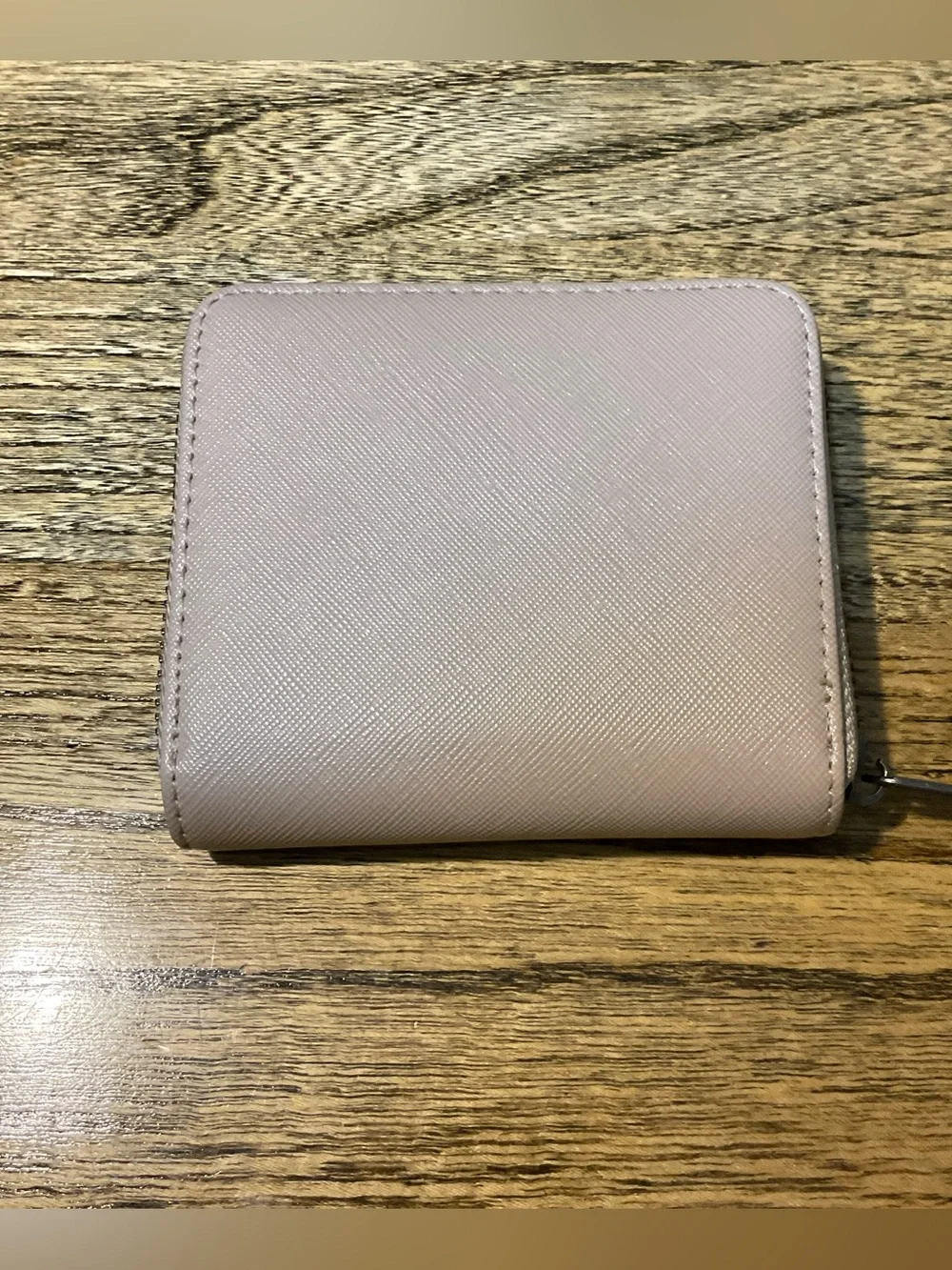 Sansibar Zip Wallet, signature crossed saber metal logo on front, rose/taupe